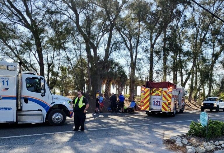 West Manatee Fire Rescue first responders tend to a 10-year-old West Virginia girl who was struck by a car in the 1300 block of Gulf Drive North in Bradenton Beach. – MARK PLATT | SUBMITTED