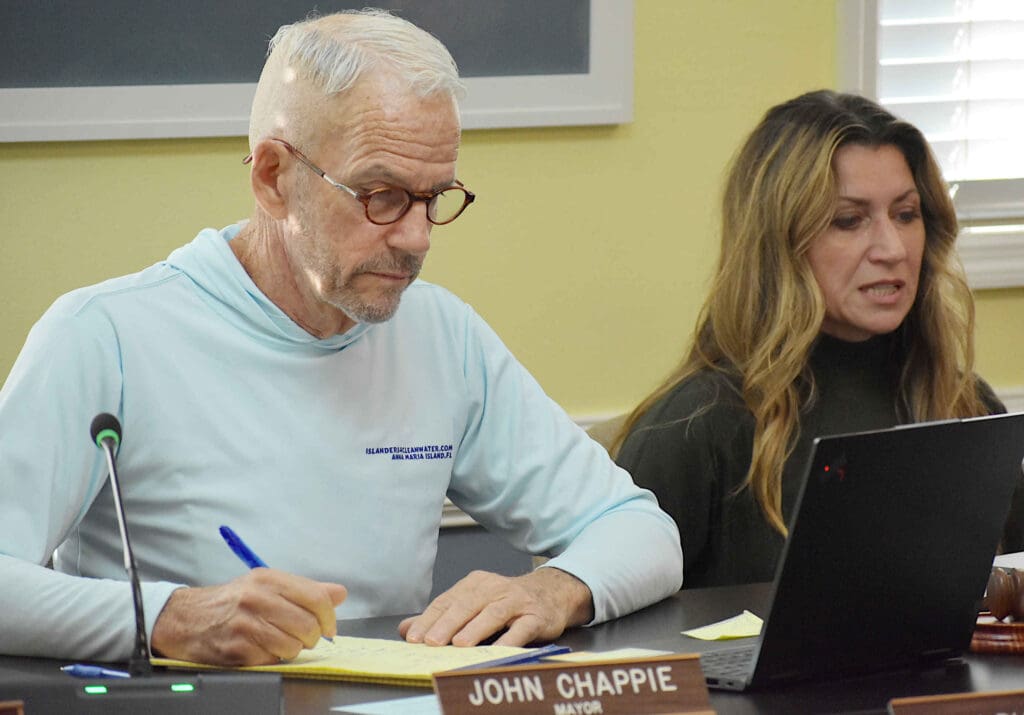 Former building official alleges pressure to condemn properties, threats