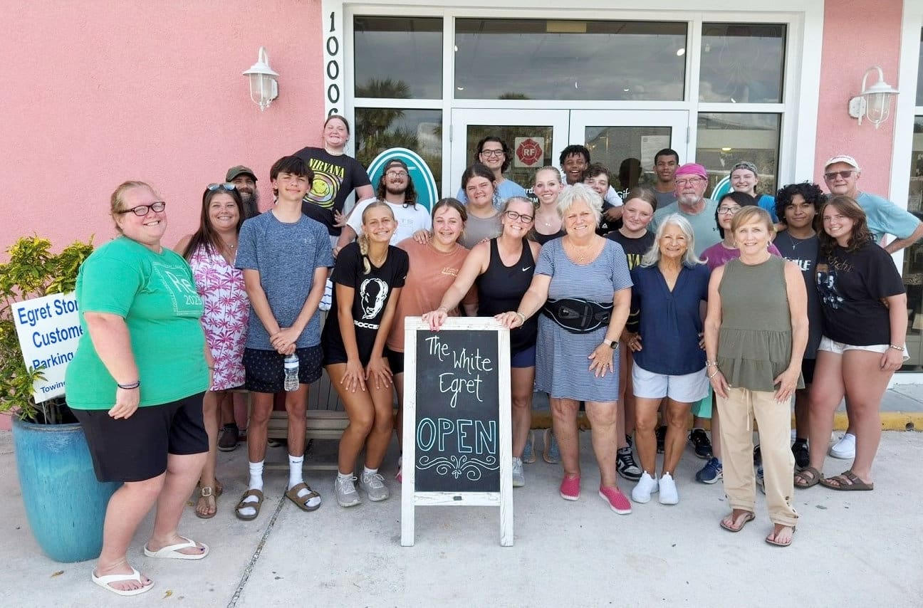 Youth group assists White Egret owners