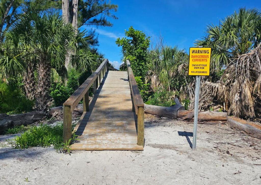 New signs address Bean Point swimming risks