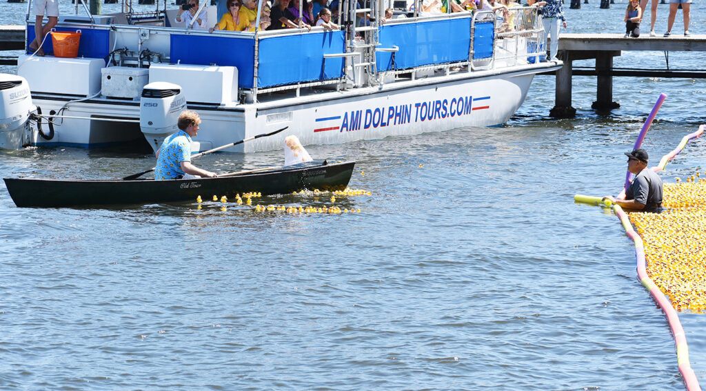 Randy Haley and Chuck Knapp wrangled the stray ducks. - Joe Hendricks | Sun