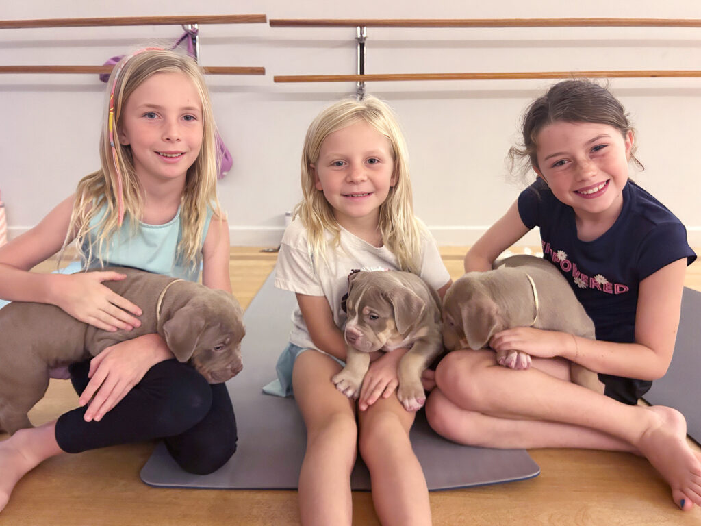 These young ladies enjoyed their puppy time. - Submitted