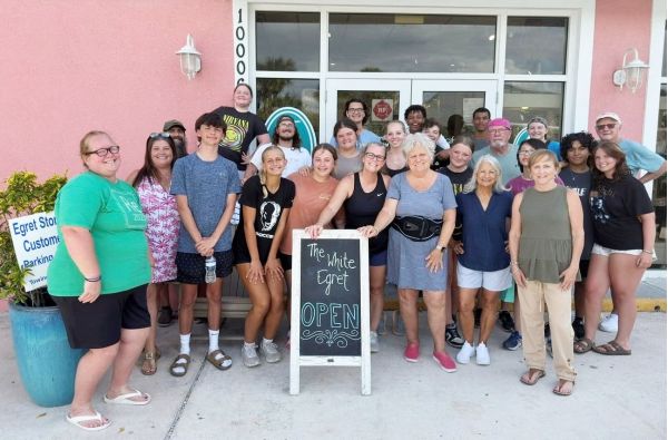 Youth group assists White Egret owners