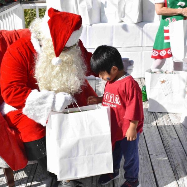 Chiles Group hosts Christmas party for underprivileged kids