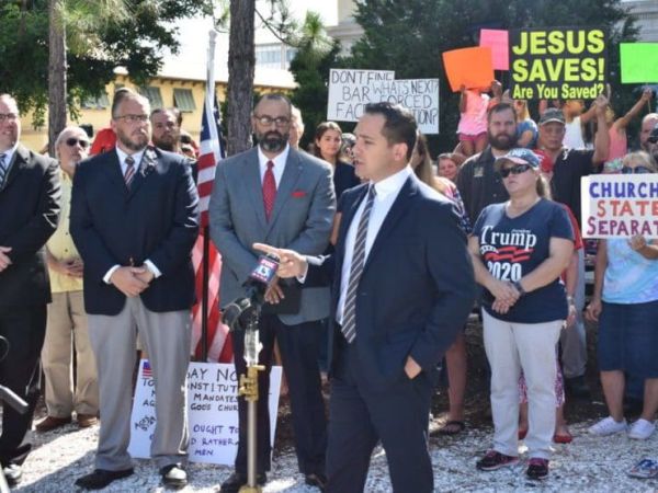 Pastor and state representative challenge county mask mandate