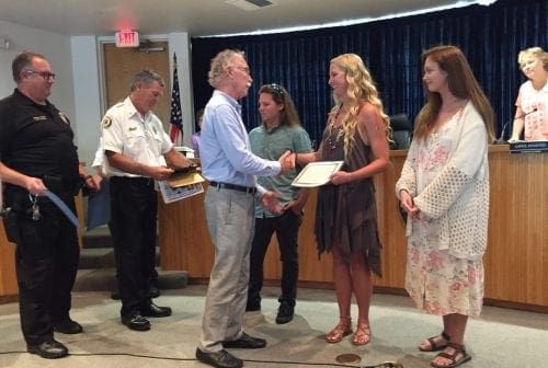 Holmes Beach surf shop fire award Mayor