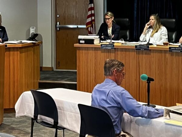 Gloves come off in parking garage discussion