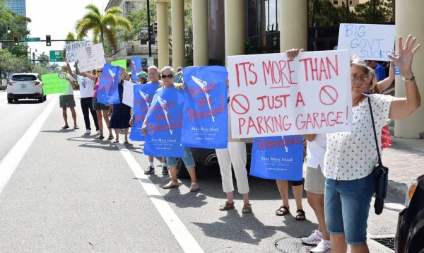 Protestors oppose beach parking garage