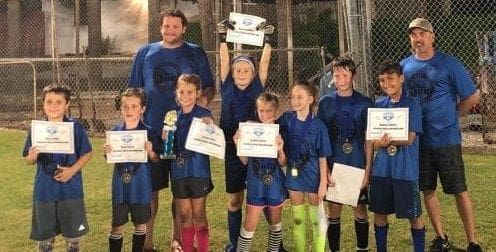 Young and old play the field at The Center