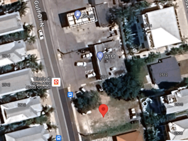 Commissioners deny paid parking lot