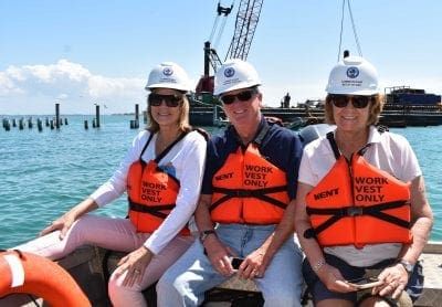 County commissioners tour pier construction site