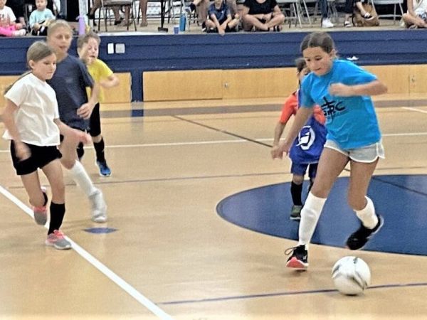 Youth beat the heat with indoor soccer