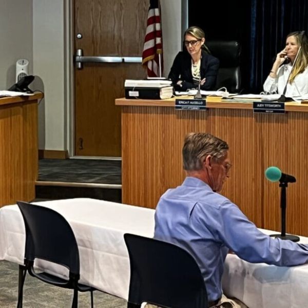 Gloves come off in parking garage discussion