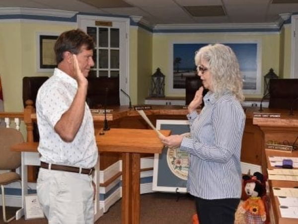 Bradenton beach swearing in Cole