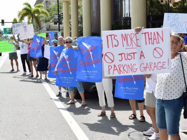 Protestors oppose beach parking garage