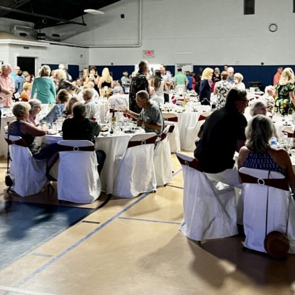 Wit, wisdom and wine shine at Center event