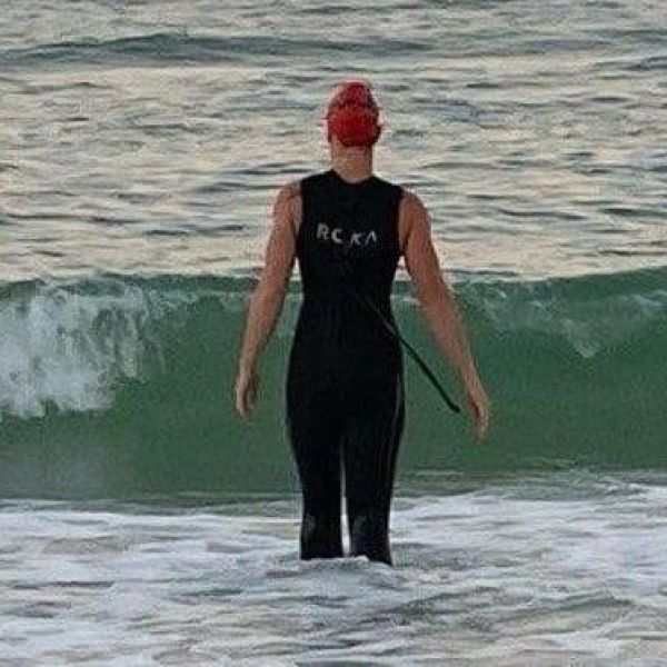 Woman completes &lsquo;round the island swim