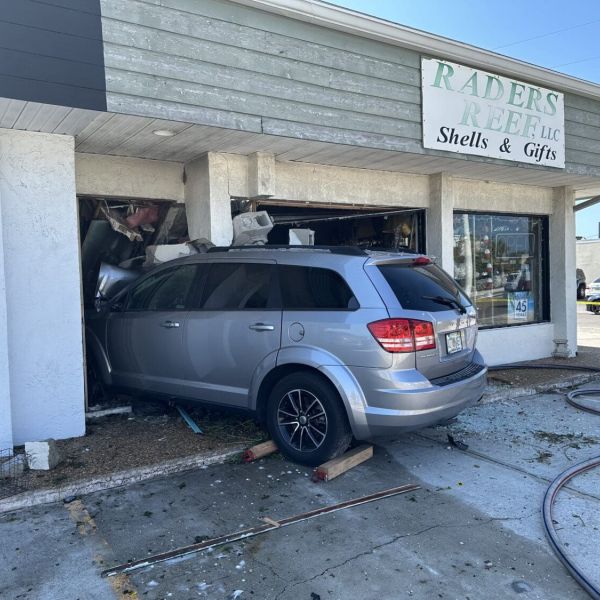 Three crashes damage two businesses, one crosswalk signal