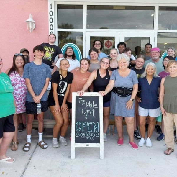 Youth group assists White Egret owners