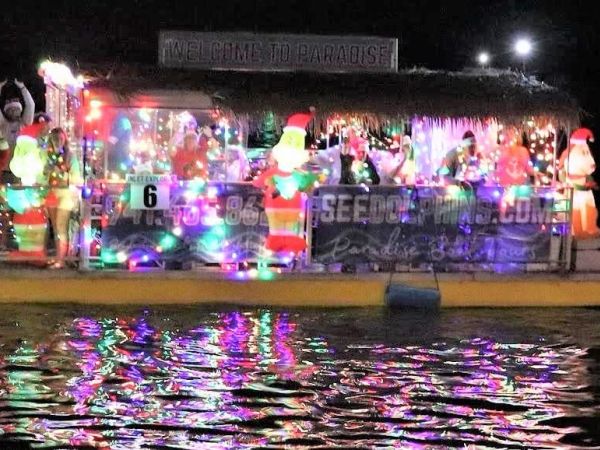Boat parade draws merrymakers to pier