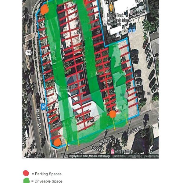 City commission to consider paid parking lots