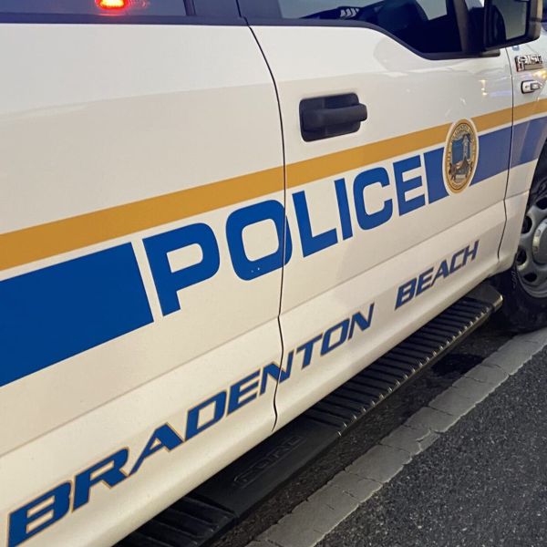 Police confront armed man on pier