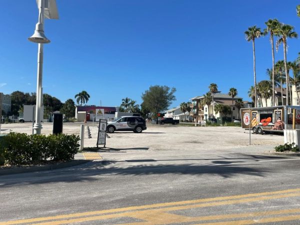 City threatens shutdown of Bridge Street parking lot