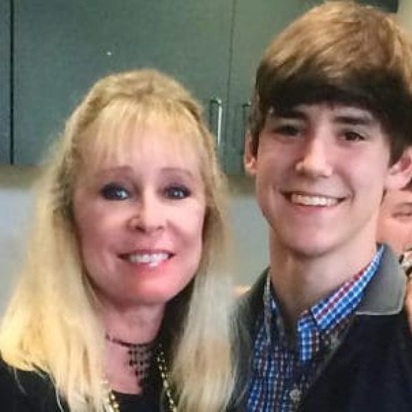 Nurse and others assist unconscious Island Time guest