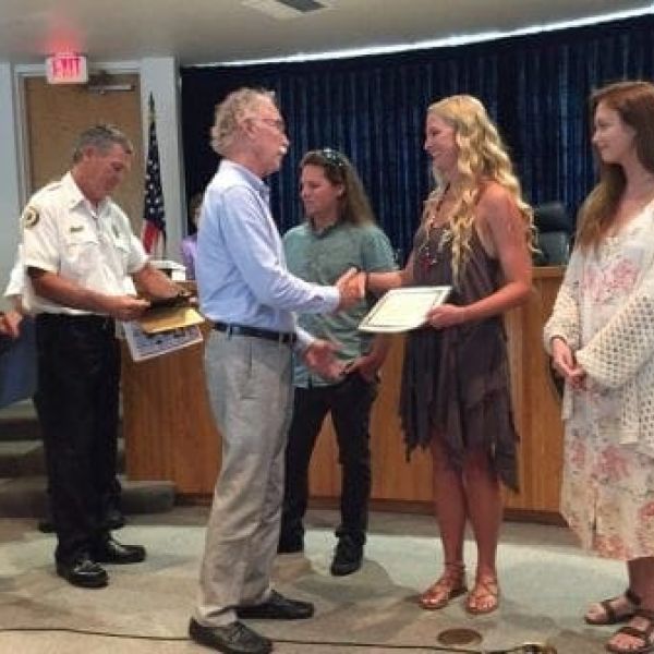 Holmes Beach surf shop fire award Mayor