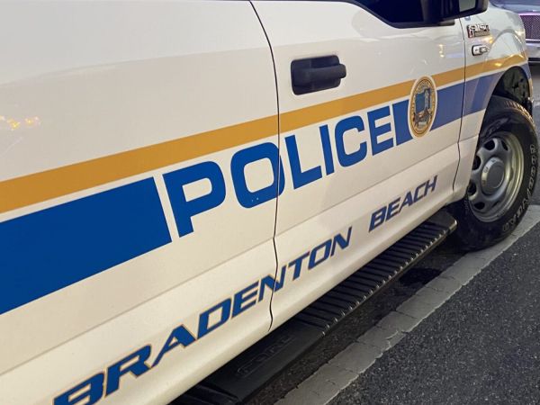 Police confront armed man on pier