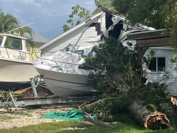 Cortez cleans up after storm surge flooding