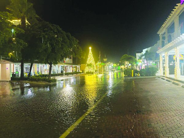 Storm, high tides flood AMI