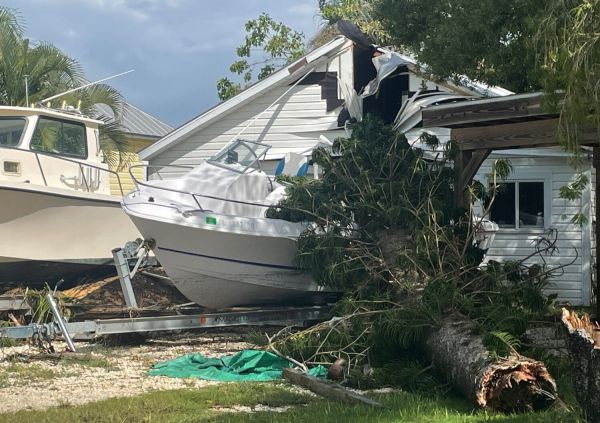 Cortez cleans up after storm surge flooding