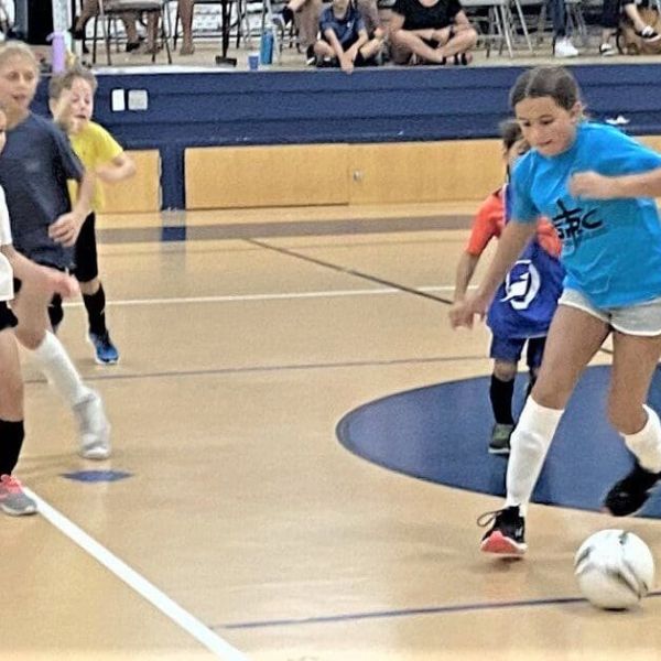 Youth beat the heat with indoor soccer