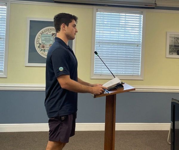 City commissioners question paid parking contract