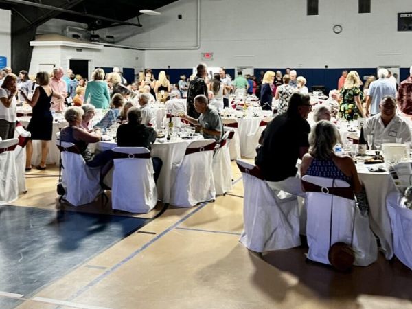 Wit, wisdom and wine shine at Center event