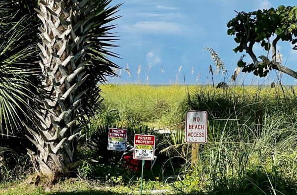 Beach access remains closed