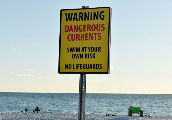 New signs address Bean Point swimming risks