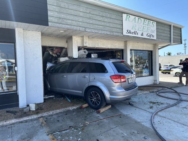Three crashes damage two businesses, one crosswalk signal