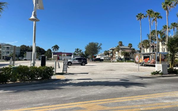 City threatens shutdown of Bridge Street parking lot