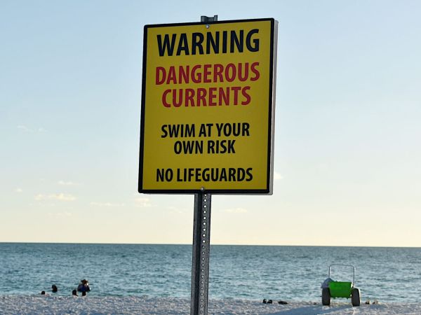 New signs address Bean Point swimming risks