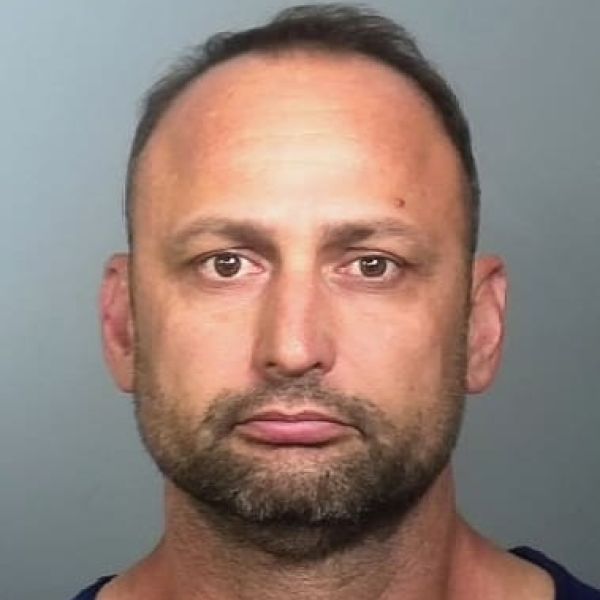 Man arrested after driving Jeep into water