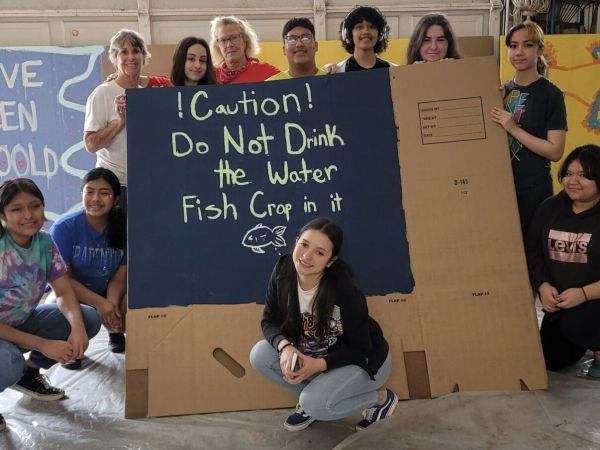 Local students add art to trash