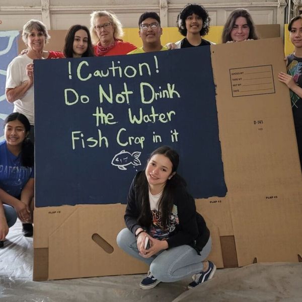 Local students add art to trash