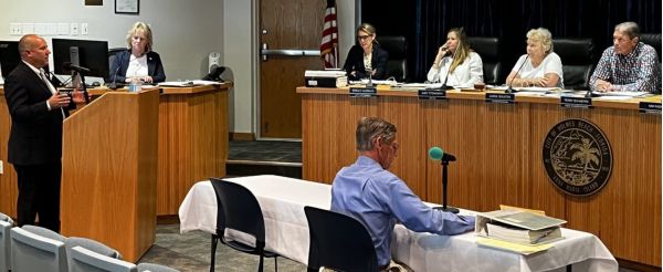 Gloves come off in parking garage discussion