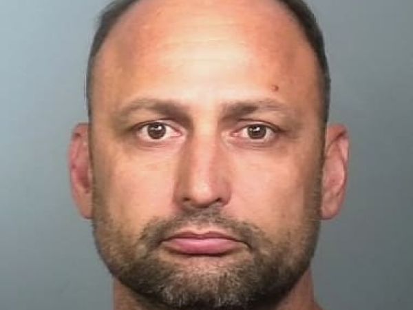 Man arrested after driving Jeep into water