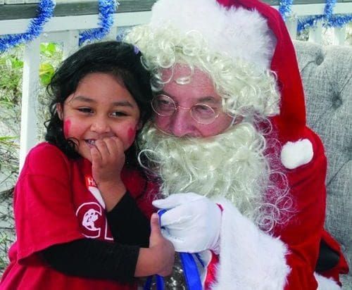Kids see Santa at Sandbar